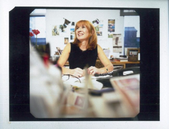 Nicole Miller at her desk